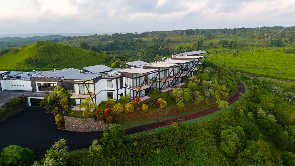 Aerial view of Pikaia Lodge suites on the crater rim