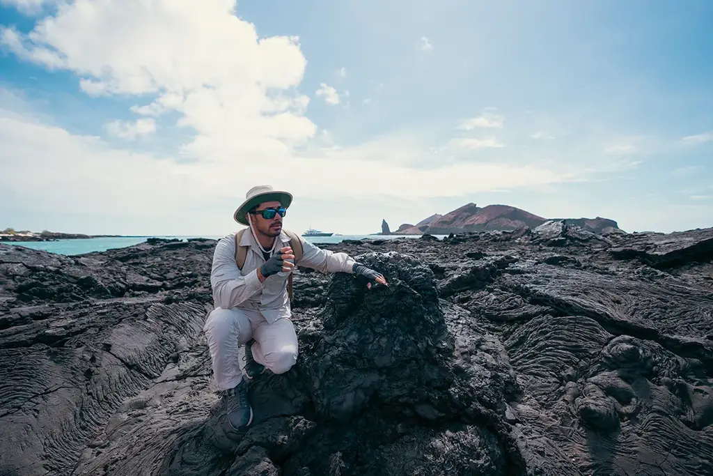Guest on volcanic rock in the Galápagos