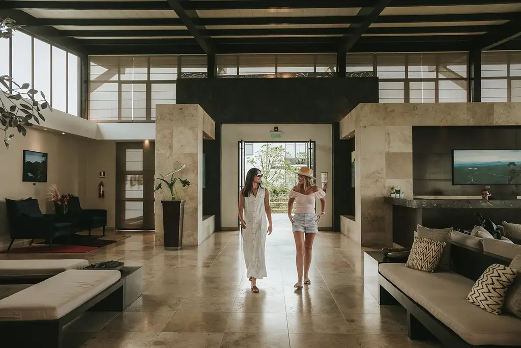 Guests walking through the lodge lounge