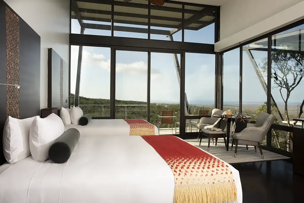 Balcony room with twin beds and panoramic windows