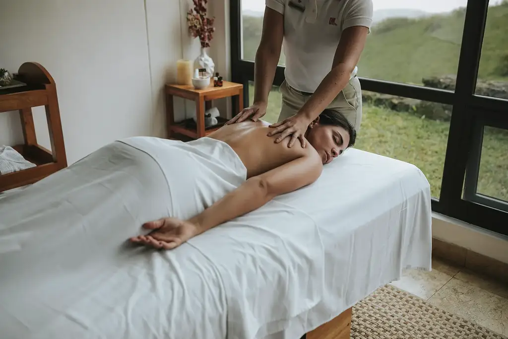 Guest looking out from SUMAQ Spa
